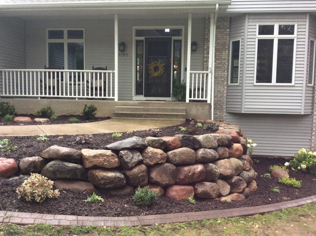 Boulder wall by Urban Landscaping Solutions